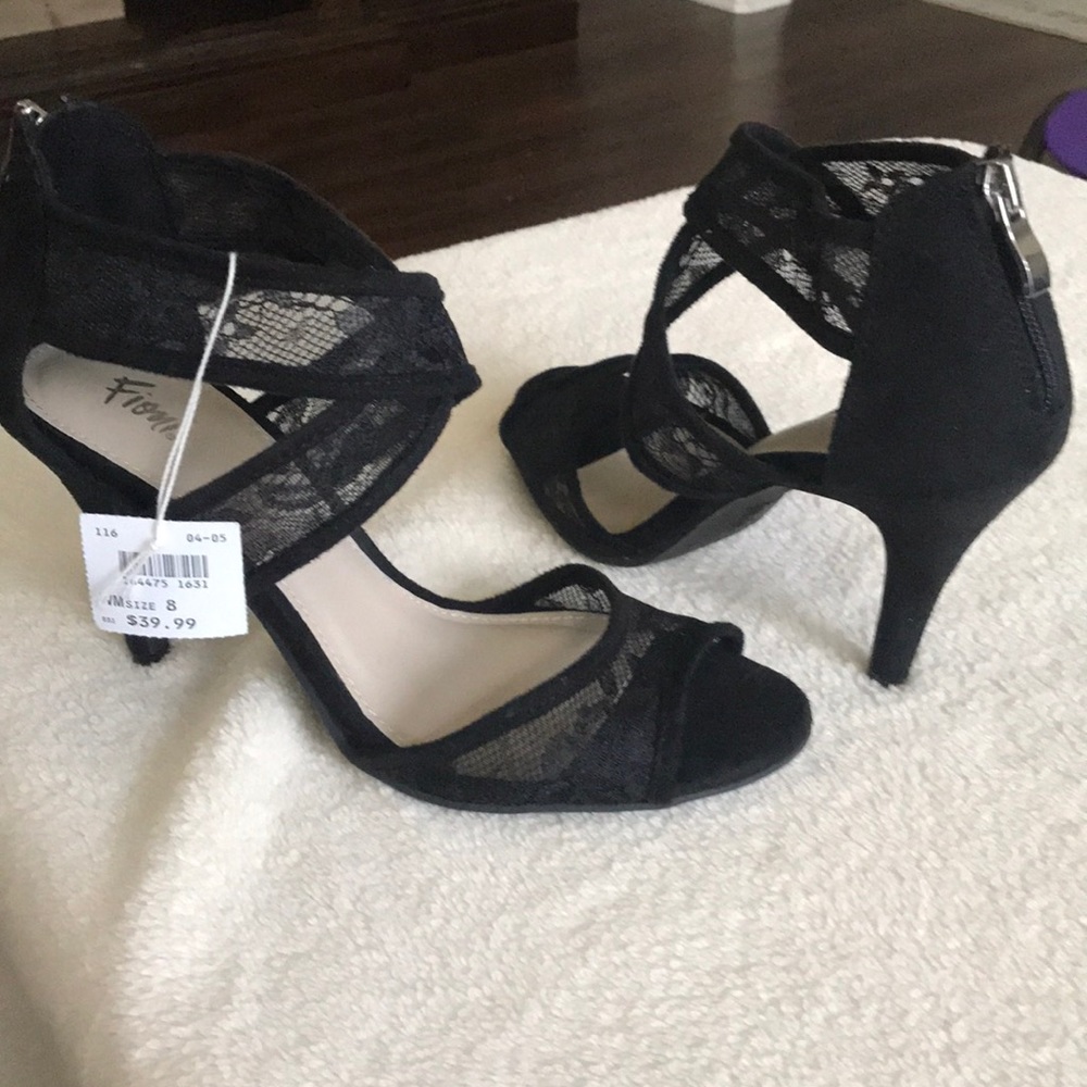 NWT black stiletto heels.